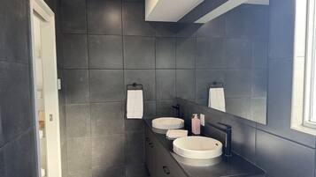 Hair dryer, towels, soap, toilet paper