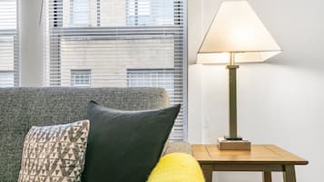 Classic Apartment, 1 King Bed | Living area | 55-inch TV with digital channels, streaming services