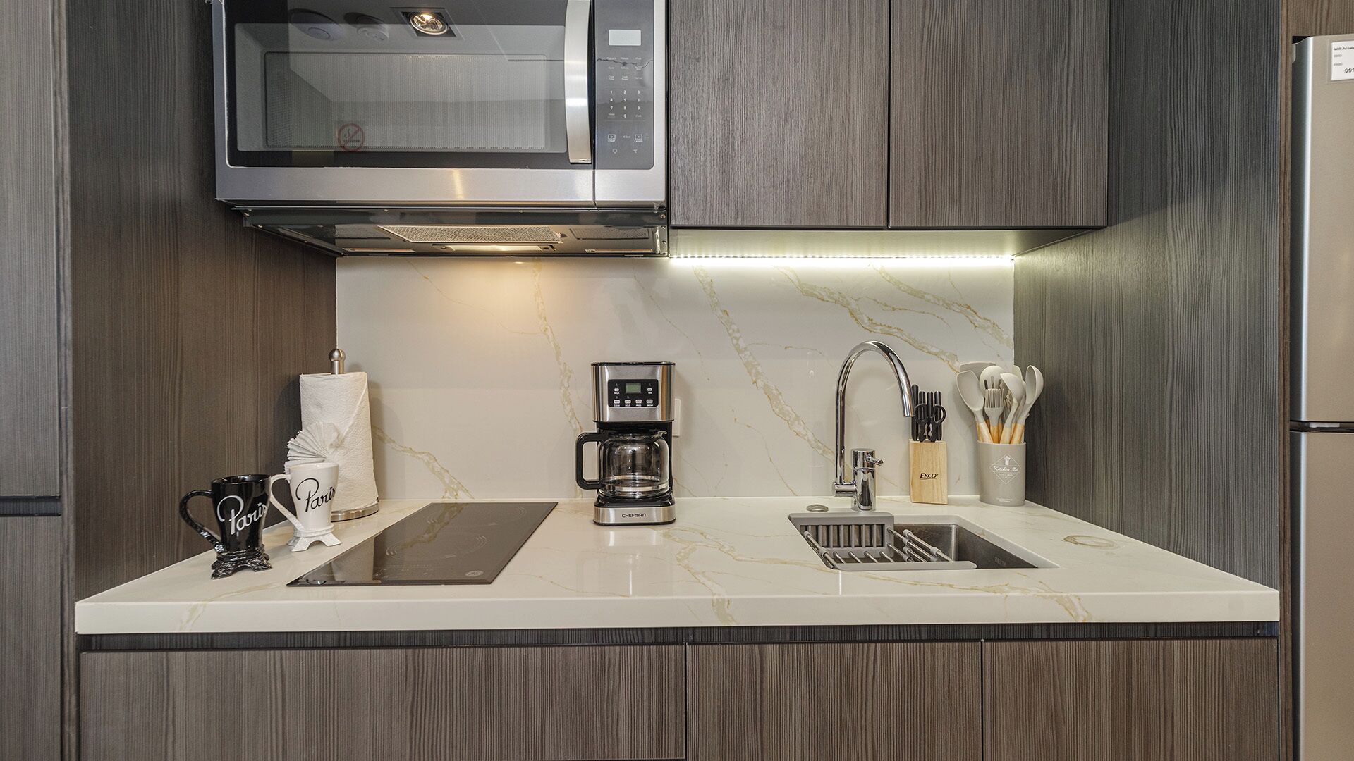 Fridge, microwave, stovetop, coffee/tea maker