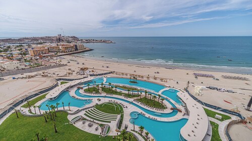 One 1407B: Elegant Beachfront Getaway with Unmatched Views