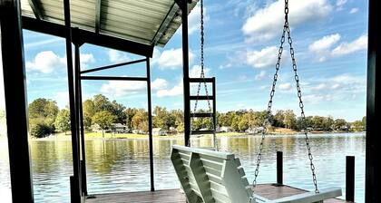 Lakefront home with covered boat dock on Lake Secession in Abbeville, SC.