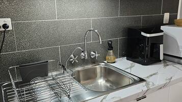 Microwave, stovetop, coffee/tea maker, electric kettle