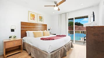 3 habitaciones, escritorio y tabla de planchar con plancha