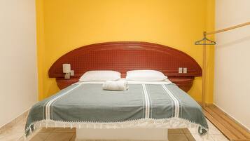 Habitación empresarial | Ropa de cama de alta calidad, wifi gratis y ropa de cama