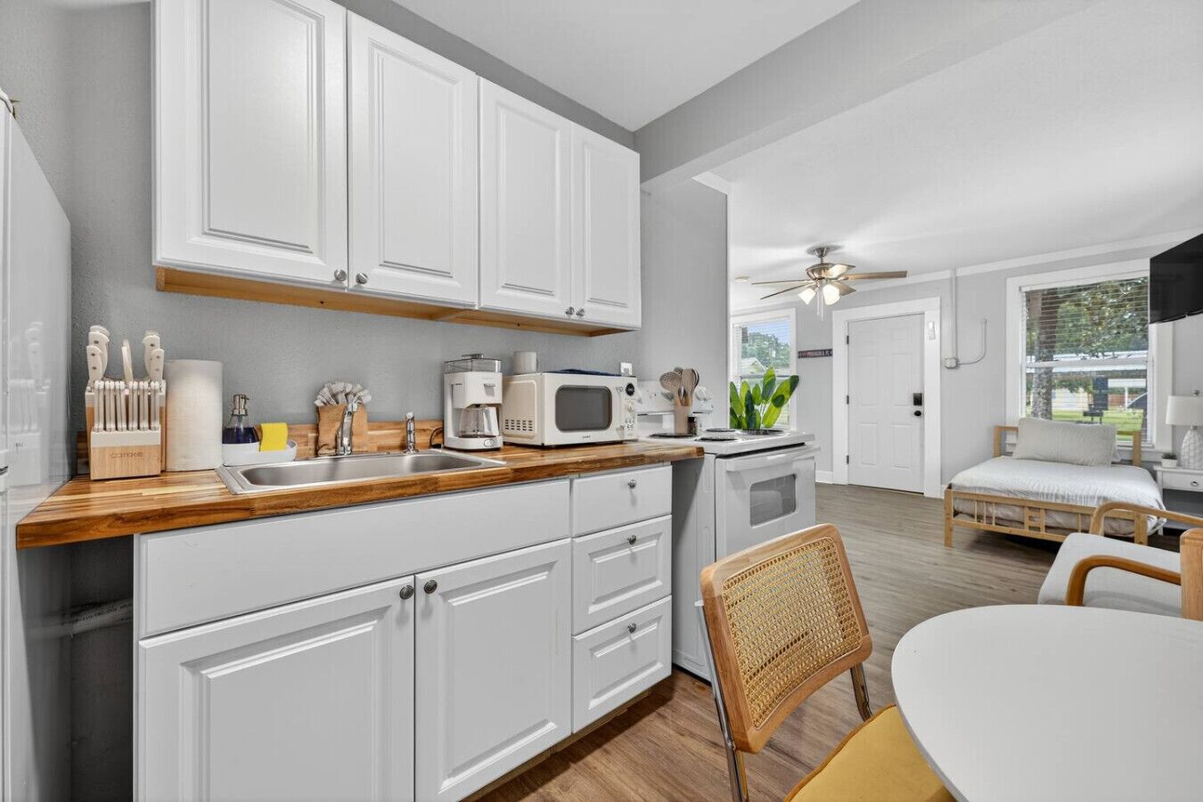 Fridge, microwave, stovetop, coffee/tea maker