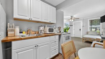 Fridge, microwave, stovetop, coffee/tea maker