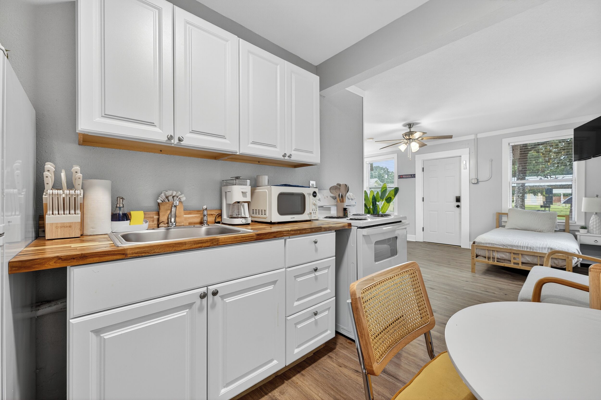 Fridge, microwave, stovetop, coffee/tea maker