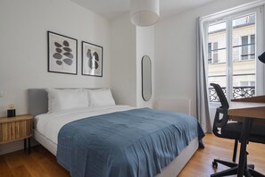 1 slaapkamer, een strijkplank/strijkijzer, wifi, beddengoed