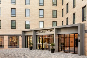 A hotel entrance with a sign reading 'AC HOTEL INVERNES'. - Ac Hotel Inverness (Inverness)