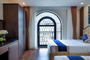 Triple Room, Balcony, City View | In-room safe, free WiFi