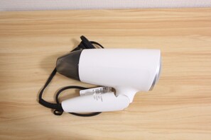 Hair dryer, towels, soap, toilet paper