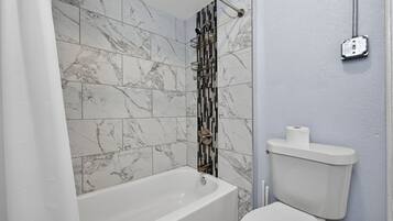 Hair dryer, towels, soap, shampoo