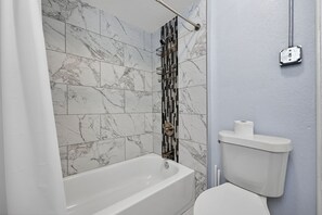 Hair dryer, towels, soap, shampoo