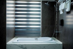 Shower, free toiletries, hair dryer, towels
