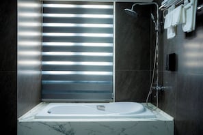 Shower, free toiletries, hair dryer, towels
