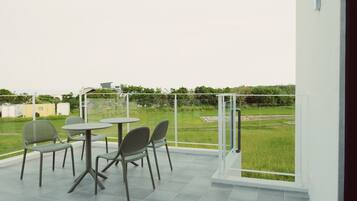 Habitación cuádruple panorámica | Terraza o patio