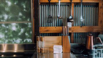 Room | Private kitchen | Stovetop, cleaning supplies, freezer, paper towels