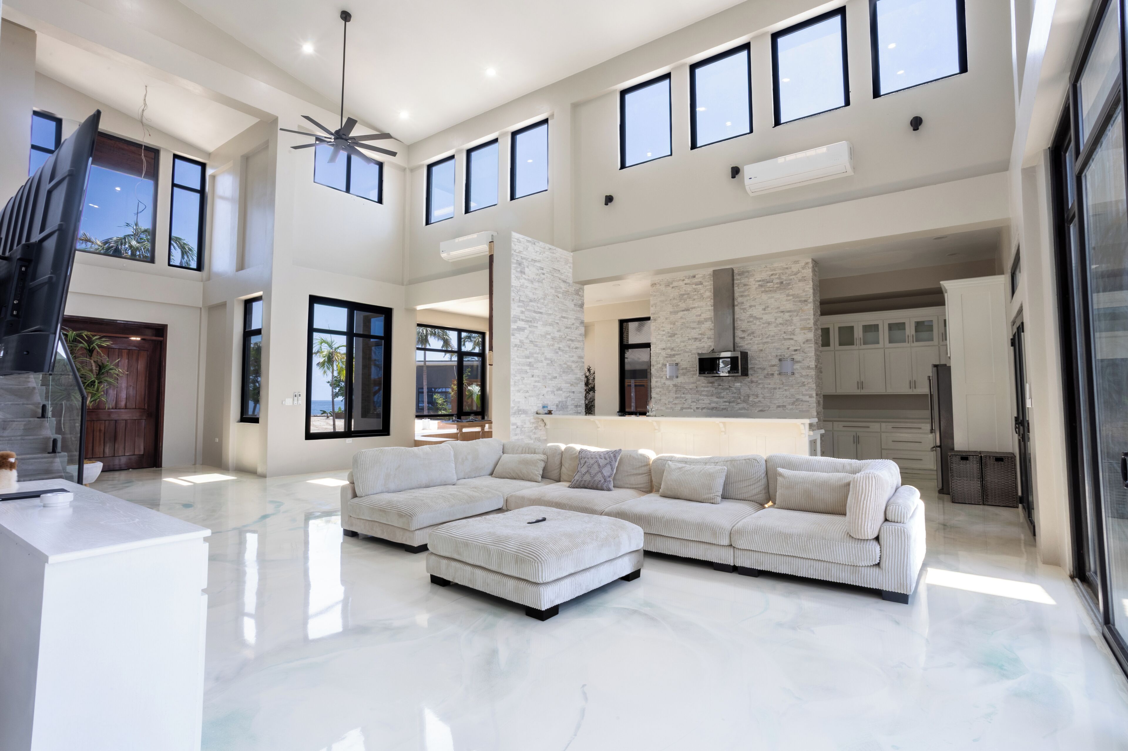 Luxury Villa, Ocean View | Living area | 53-inch Smart TV with cable channels, toys