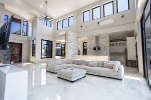 Luxury Villa, Ocean View | Living area | 53-inch Smart TV with cable channels, toys