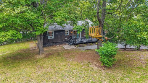 Cozy Cabin w Fire Pit, Grill, Deck & Walk to Town