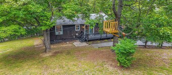 Cozy Cabin w Fire Pit, Grill, Deck & Walk to Town