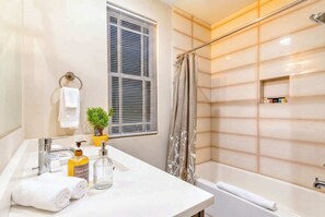 Shower, hair dryer, towels