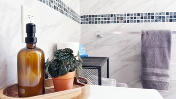 Hair dryer, towels, soap, toilet paper