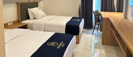 Deluxe Twin Room, City View | Desk, laptop workspace, free WiFi