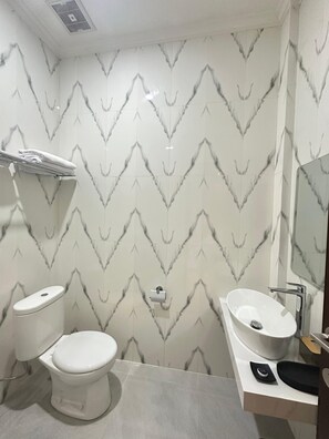 Shower, slippers, towels, soap