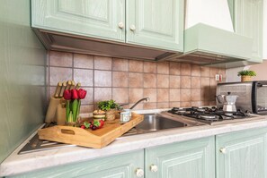 Standard Apartment, Multiple Bedrooms, Mountainside (Domus De Pedra Pertunta) | Private kitchen | Fridge, microwave, oven, stovetop