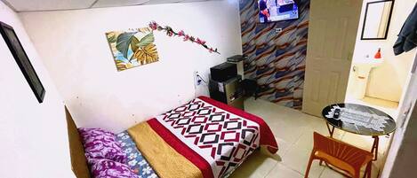 Blackout drapes, free WiFi, bed sheets