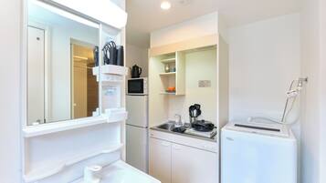 Fridge, microwave, stovetop, cookware/dishes/utensils