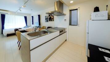 Fridge, microwave, stovetop, cookware/dishes/utensils