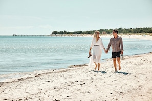 On the beach, white sand