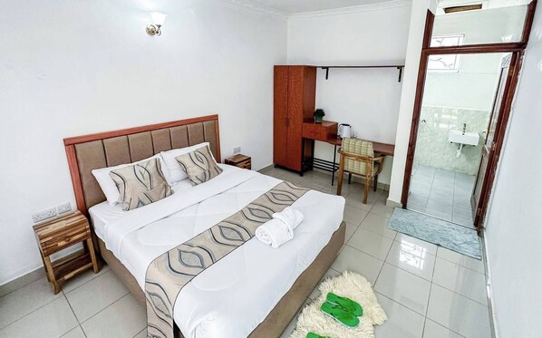 Habitación doble Deluxe, vista al jardín | Wifi gratis y ropa de cama 