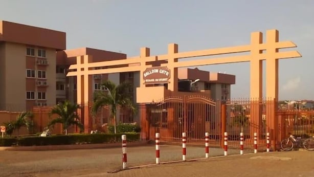 A gated entrance with a sign reading "Balloon Gate." - Regimanuel Estates  (Kwabenya)