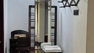 Blackout drapes, soundproofing, iron/ironing board