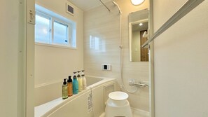 Separate tub and shower, free toiletries, hair dryer, towels