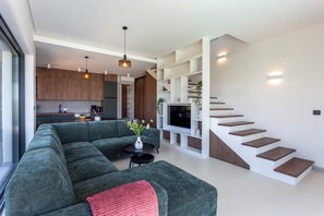 Family Villa, Multiple Bedrooms (Villa Petra with Pool and Sea View) | Living area | 21-inch flat-screen TV with cable channels - Villa Petra with Pool and Sea View (Medulin)