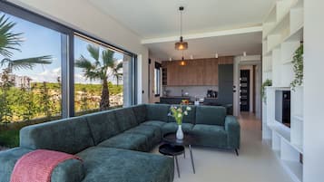 Family Villa, Multiple Bedrooms (Villa Petra with Pool and Sea View) | Living area | 21-inch flat-screen TV with cable channels