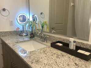 Hair dryer, towels, soap, toilet paper