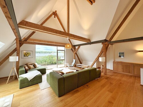 Rural idyll in a thatched-roof house with sauna