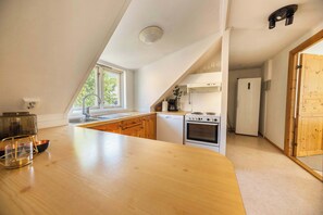 Réfrigérateur, four, plaque de cuisson, lave-vaisselle