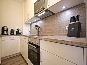 Fridge, oven, dishwasher, coffee/tea maker