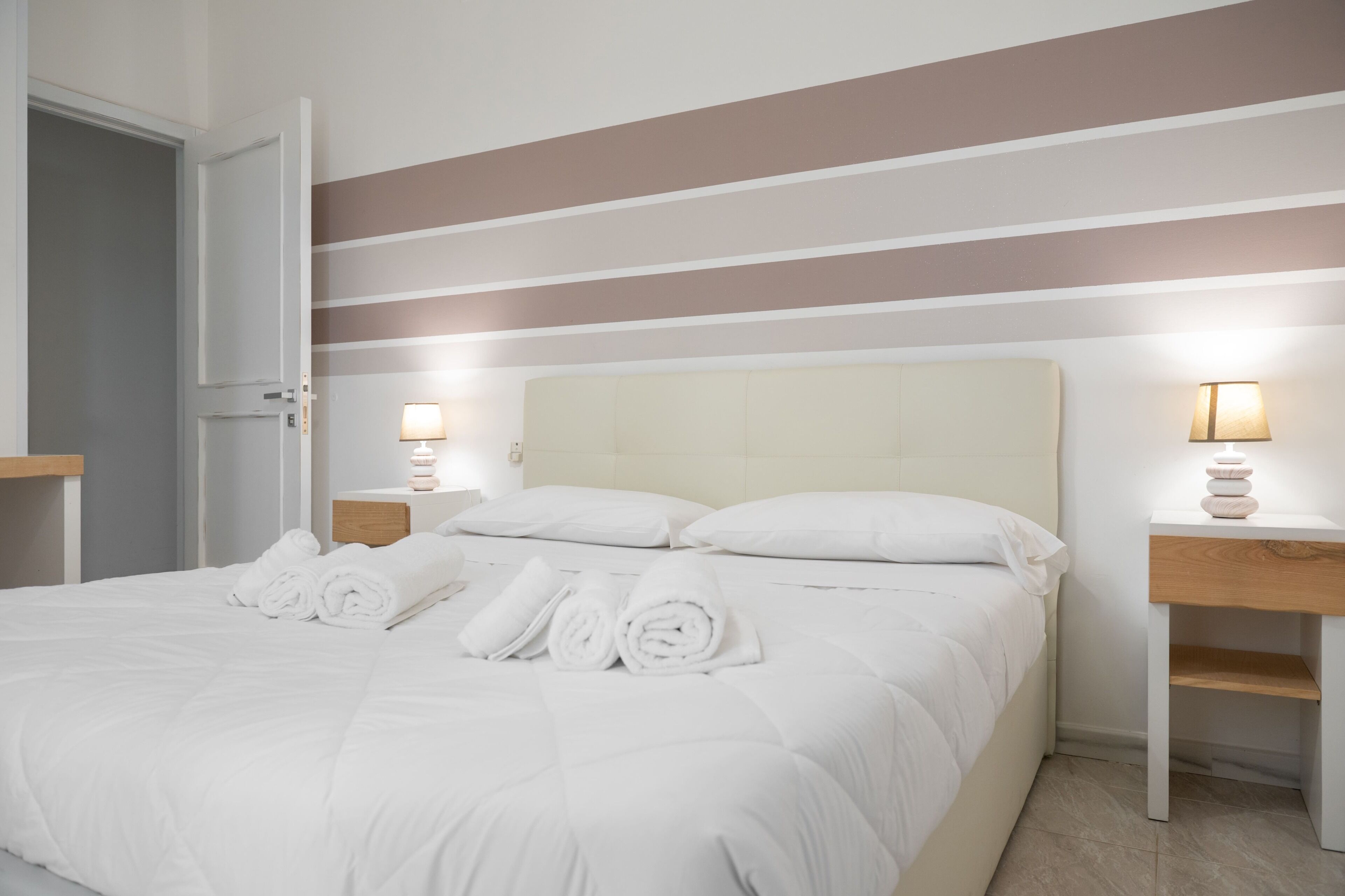 Quadruple Room | Minibar, in-room safe, desk, cribs/infant beds