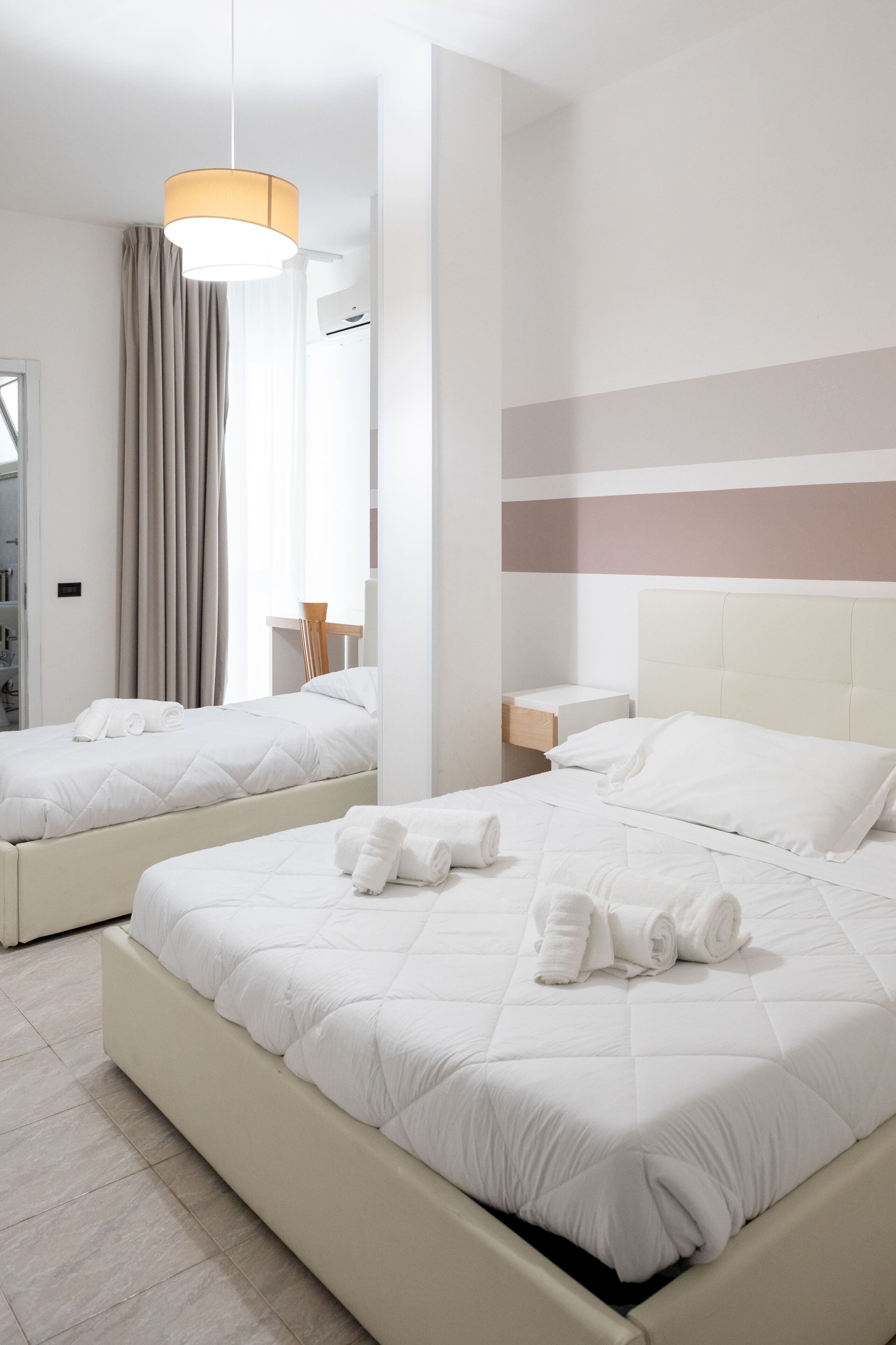 Triple Room | Minibar, in-room safe, desk, cribs/infant beds