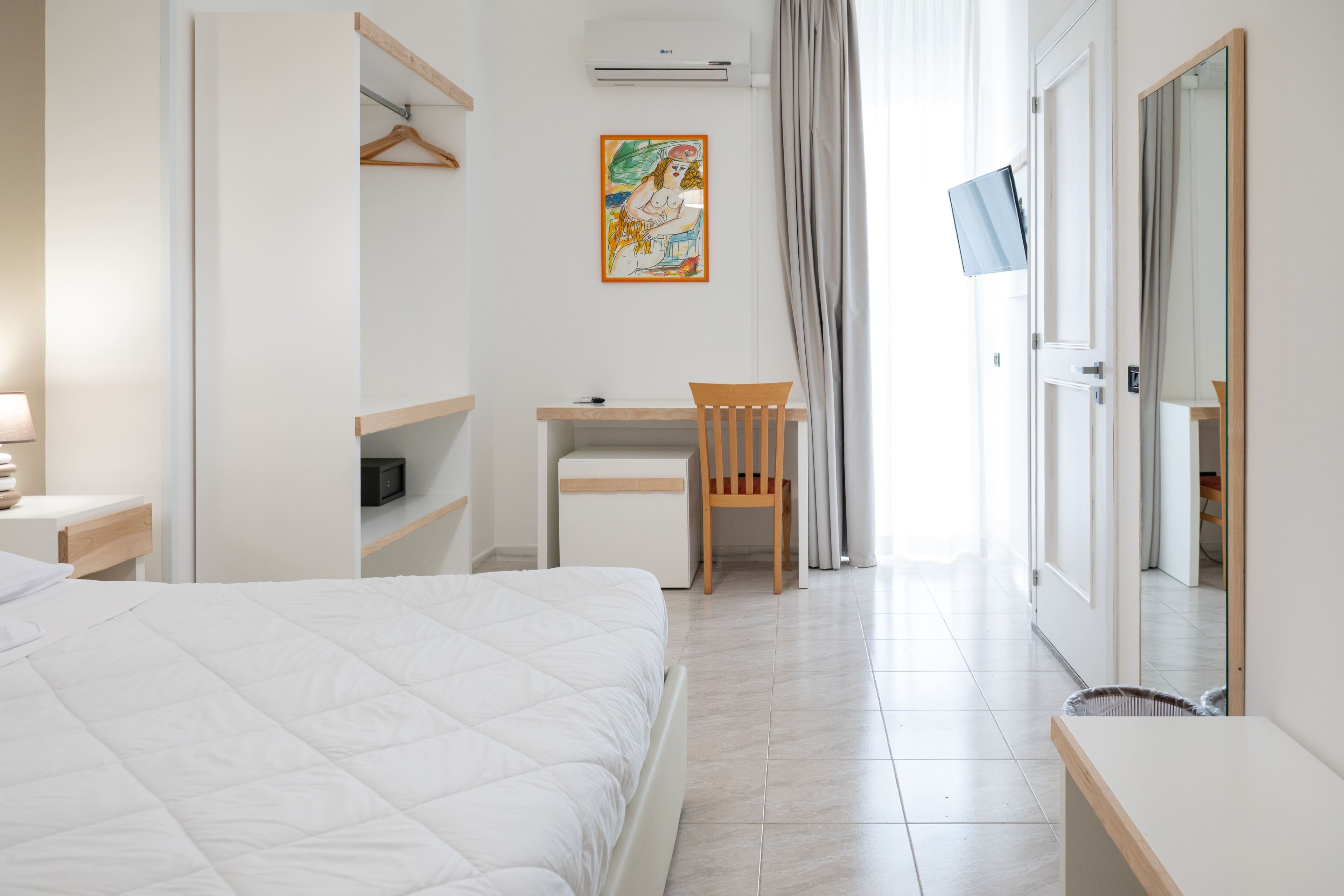 Quadruple Room | Minibar, in-room safe, desk, cribs/infant beds