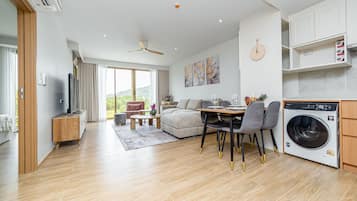 Junior Apartment, Patio | Living room | 50-inch LCD TV with digital channels