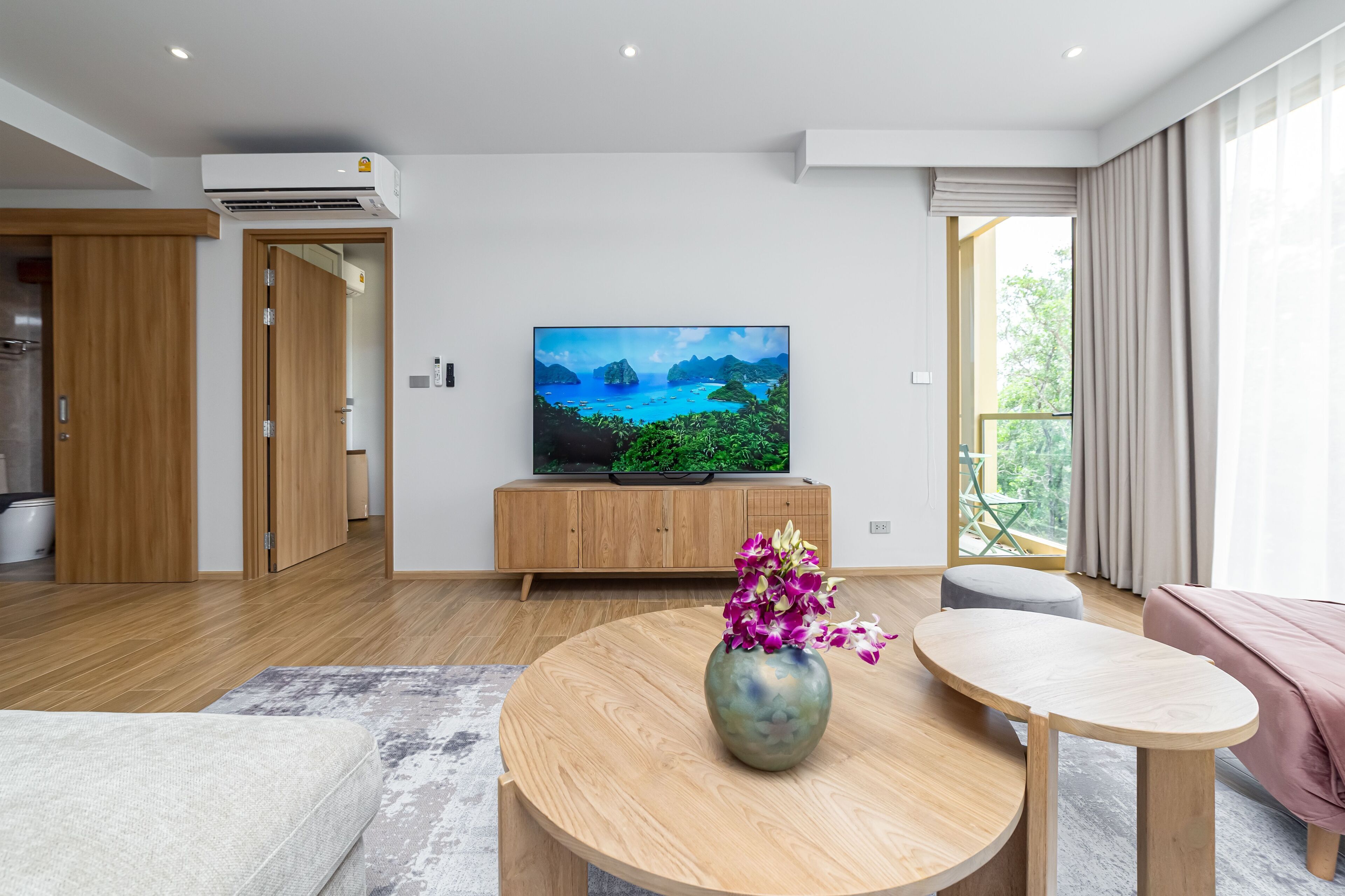 Junior Apartment, Patio | Living area | 50-inch LCD TV with digital channels