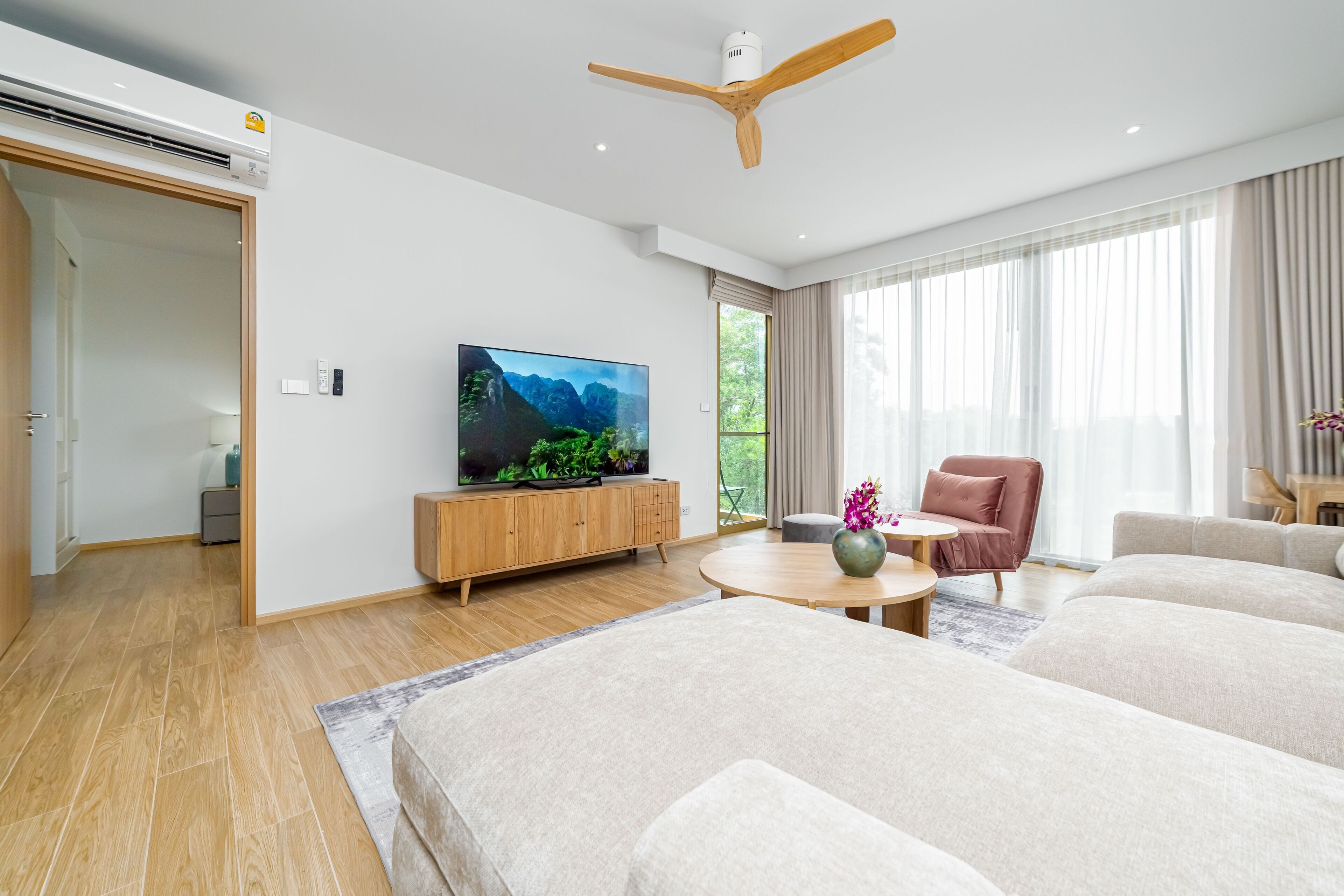 Junior Apartment, Patio | Living area | 50-inch LCD TV with digital channels